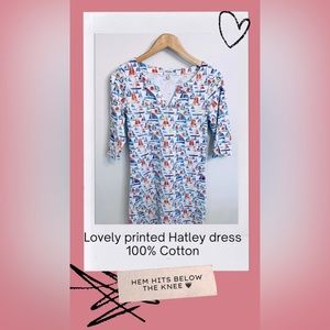 This simple semi-fitted dress is made from 100% cotton and is xs.